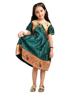 Paithani Baby Girl Frock – Green Silk with Brocade Yoke & Peacock Zari Border – Indu Pattern
