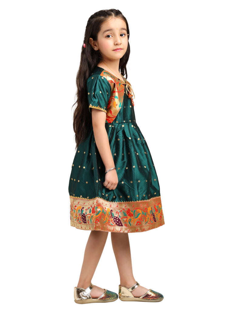 Paithani Baby Girl Frock – Green Silk with Brocade Yoke & Peacock Zari Border – Indu Pattern