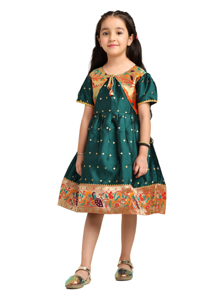 Paithani Baby Girl Frock – Green Silk with Brocade Yoke & Peacock Zari Border – Indu Pattern