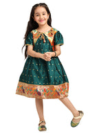 Paithani Baby Girl Frock – Green Silk with Brocade Yoke & Peacock Zari Border – Indu Pattern